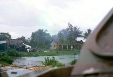 Taken during an exchange of fire with the enemy on the road south from the market place.